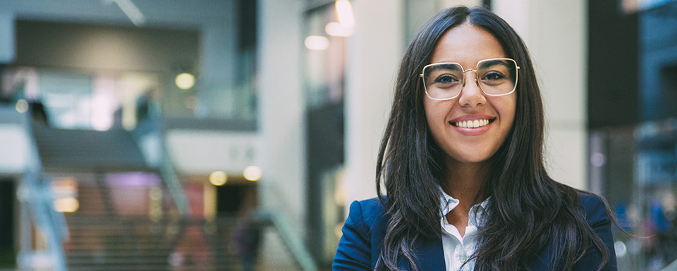 Labor relations and human resources professional in a corporate office setting, taking UWM training in labor laws and union management.