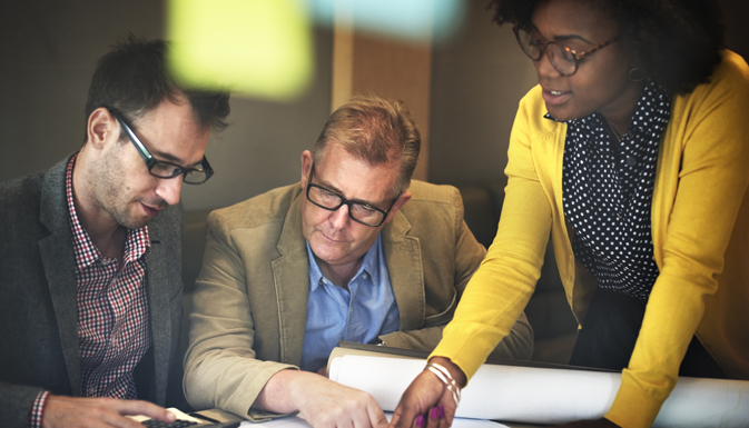 Engineering leaders working together to solve advanced problem